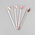 Four neutral gel pens with silicone cake-shaped caps in white, pink and brown colors - Cartoon Dessert Gel Pen