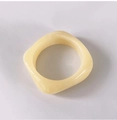 Pale yellow resin square bangle with marble pattern and smooth rounded edges - Brown