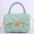Mini mint green jelly handbag with diamond quilting and gold heart twist lock - Green