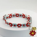 Detailed view of white floral embroidered pet collar with golden bell and flower pendant - Flower Pendant/Metal Bell / Big Red Small Flower