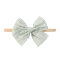 Detail of light green lace bow headband for babies with soft seamless nylon band - Light Green