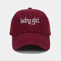 Close-up of white baby girl embroidery on a burgundy cotton baseball cap with curved brim - Burgundy