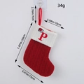 Red knitted Christmas stocking with white cuff and embroidered letter P with Santa hat - Letter P Style