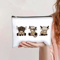 Handheld highland cow printed makeup bag with a large capacity and zipper closure - Three Cartoon Highland Cows (jiayingpbb0107)
