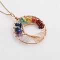 Detailed close-up of golden Tree of Life pendant with seven chakra natural stones - Gold Tree of Life Pendant O-Chain Necklace