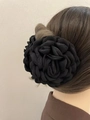 Large black fabric rose hair claw clip for women shown on a side hairstyle - 12cm / Black