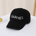 Detail of kids baseball cap showing white embroidered excavators and construction trucks - 54cm / Black