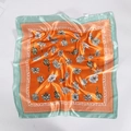 Orange silk-like square scarf with floral patterns and light green geometric border - Green Tangerine