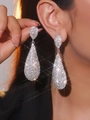 Macro detail of long teardrop earrings with luxury sparkling rhinestones on model - Silver Waterdrop Rhinestone (DTE1617085S-W)