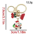 Cartoon Santa Claus Christmas keychain with red green bells and gold finish - ER1795-Bell Plaque Music Santa 8-shape Keychain