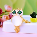 Golden owl keychain with green crystal eyes and white opal stone body for bags - A430 Owl H Moonstone