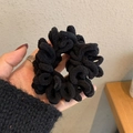Elastic black chenille hair scrunchie with soft plush texture and fluffy pleated design - Black
