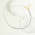 Detail of pink and black MGB glass beads necklace with a natural freshwater pearl pendant - Pink And Black (NE2143-B)