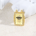 Macro shot of gold-plated copper UFO pendant with black enamel and clear rhinestones - Black UFO Style (ZYN-DMK878G-2)