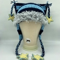 Handmade striped crochet cat ear hat in blue tones with plush trim and star charms - Blue and Black Striped