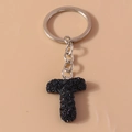 Floral letter T keychain with black roses and shimmering purple blue glitter finish - Letter T
