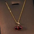 Gold chain necklace with double red cherry pendant and sparkling crystal leaves - Gold - Double Red Cherry
