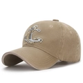 Faded khaki cotton baseball cap featuring detailed anchor embroidery and curved brim - Beige
