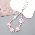 Handyanhänger mit rosa Plüschkugeln und Pixel-Herz-Perlen auf Vintage-Papier - Handykette / Rosa