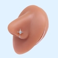 Detail of silver cross nose stud with clear zircon on a realistic skin model - Silver Cross White Gemstone (#4)