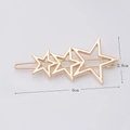 Detail showing dimensions of a gold alloy star-shaped hair clip with three hollow stars - Three Small Stars Gold