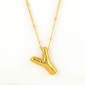 Polished gold-plated necklace featuring a bamboo-textured puffy letter Y pendant - Gold - Y