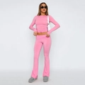 Completo da donna rosa con top corto a maniche lunghe e pantaloni a zampa a vita alta - XS / Top E Pantaloni / rosa scuro