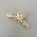 Close-up of cream marble pattern acetate hair claw clip with smooth texture and sturdy teeth - Slim Bar / Beige Slim Bar