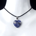 Blue heart natural crystal pendant necklace with black woven cord on mannequin - Blue Sodalite