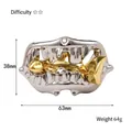 Casse-tête en forme de bouche argentée avec arête de poisson dorée, 63x38mm, 64g - Évasion de la Bouche Magique