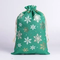 Christmas green drawstring linen gift bag featuring gold and white snowflake patterns - Green Large Snowflake