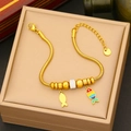Gold snake chain bracelet with colorful fish charm and zircon beads on beige jewelry box - Gold Color (Enamel Small Fish Style)