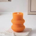 Bright orange pillar candle with elegant wavy texture for chic home interior decor - Origami Geometric Type I / Orange
