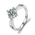 Macro detail of S925 sterling silver ring featuring four-prong set round pink zircon - Adjustable Open / Star Light Criss-Cross Four-Prong (1 Carat Effect)