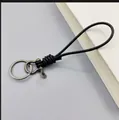 Handmade black leather keychain with a vintage dark gray horseshoe D-ring and cord - Black Leather Silver Horseshoe Buckle