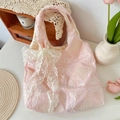 Detailed embroidery of white lace butterflies on a soft pink fabric handbag - Butterfly Light Pink + Apricot Flower Bow