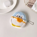 Detail of plush penguin coin purse featuring blue head and yellow mini backpack accessory - Blue