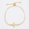 Bracciale a croce dorato regolabile con zirconi scintillanti e catena tennis fine - Stile Ciondolo a Sfera con Croce Strass (C)
