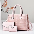 Detailed view of pink stone pattern three-piece bag set with tote, pouch, and card holder - Pink