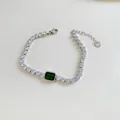 Pulsera tennis de acero inoxidable con circón verde talla esmeralda y extensión - Pulsera de Acero Inoxidable Plateado con Gema Verde Corte Esmeralda (SBP403)