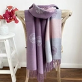 Detailed view of camellia jacquard scarf with soft tassels in purple and grey tones - Dandelion Purple