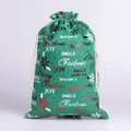 Green burlap Christmas drawstring gift bag with festive Merry Christmas typography - Green Letter