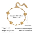 Detail view of starburst charm bracelet in gold stainless steel with product dimensions - Gold Flower Bracelet (YYB025112)