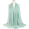 Solid light turquoise pearl chiffon scarf displayed on a white mannequin for women - Cyan