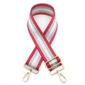 Detail of red and silver striped wide shoulder strap with adjustable gold metal buckles - Red