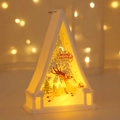 Close-up of a white LED Christmas lantern featuring a reindeer pattern and warm light - Elk