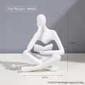 Minimalist white resin thinker figurine, sitting reader style, size 11.5x8.5x6.5cm - White Left Reading