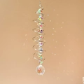 Detail of 3D spiral wind spinner with crystal ball reflecting rainbow light on wall - Crystal Ball / Silver AB Color