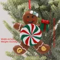 Gingerbread man Christmas tree ornament with candy details, 9cm height festive pendant - Gingerbread Girl with Gift Style J