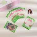 Nahaufnahme dekorativer grüner Fotohüllen mit rosa Schleifen und Mini-Aufbewahrungsbox - 60x92mm (20 Stk./Packung) / Grün